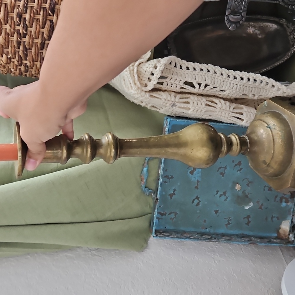 Tall brass candlestick holder